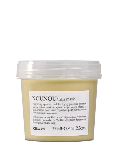 Transparente Dose mit cremiger Haarmaske der Marke Davines, Produktname „NOUNOU Hair Mask“