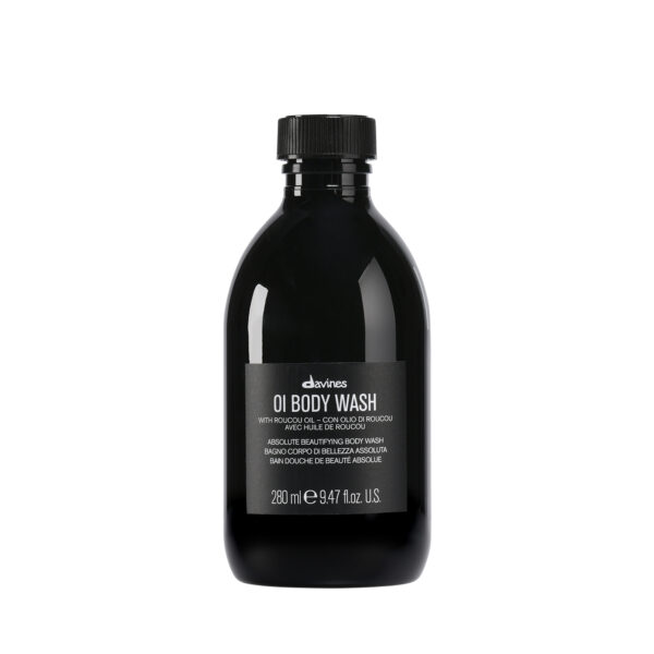 Transparente Flasche mit Duschgel der Marke Davines, Produktname „OI Body Wash“