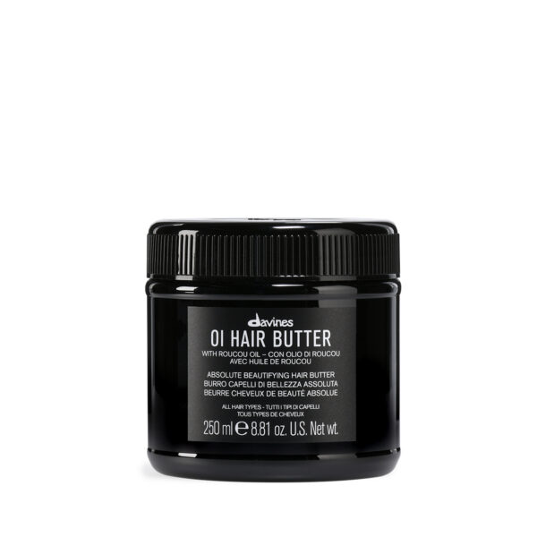 Transparente Dose mit reichhaltiger Haarbutter der Marke Davines, Produktname „OI Hair Butter“