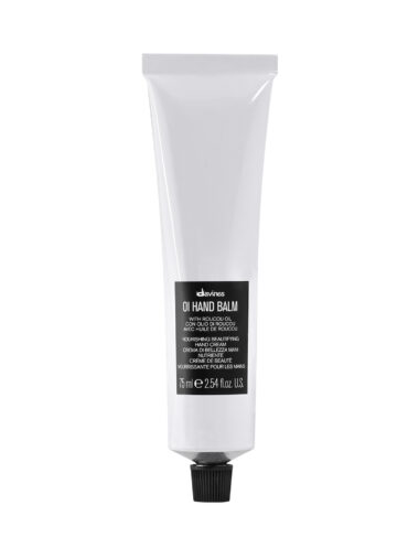 Kleine Tube mit Handbalsam der Marke Davines, Produktname „OI Handbalm“