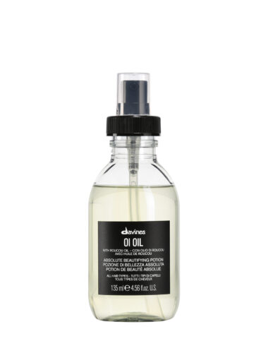 Braune Glasflasche mit Pumpspender, Produktname „Davines OI Oil