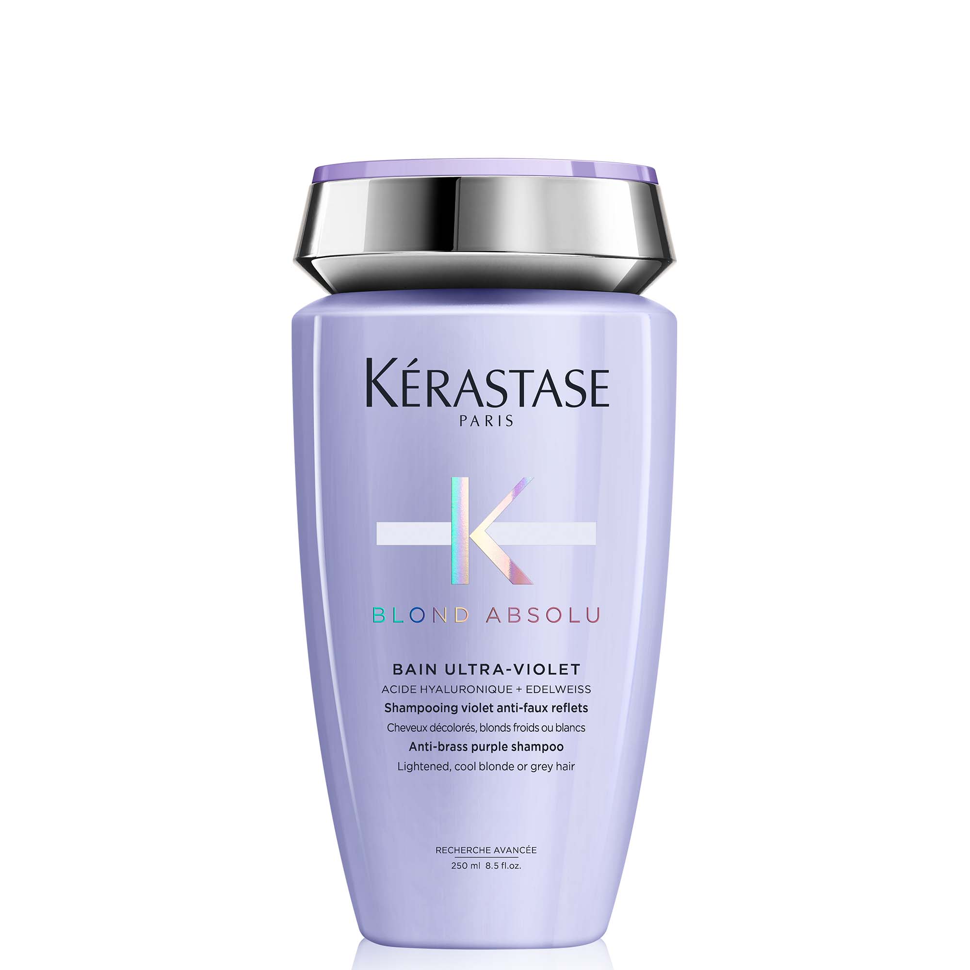 Violette Flasche mit silberfarbenem Deckel, Produktname „Kérastase Blond Absolu Bain Ultra Violet“
