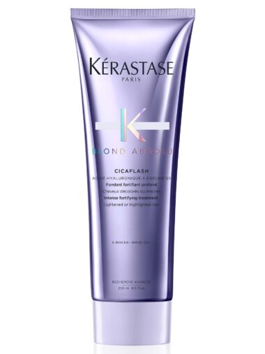 Transparente, hellblaue Tube mit silberfarbenem Verschluss, Produktname „Kérastase Blond Absolu Fondant CICAFLASH