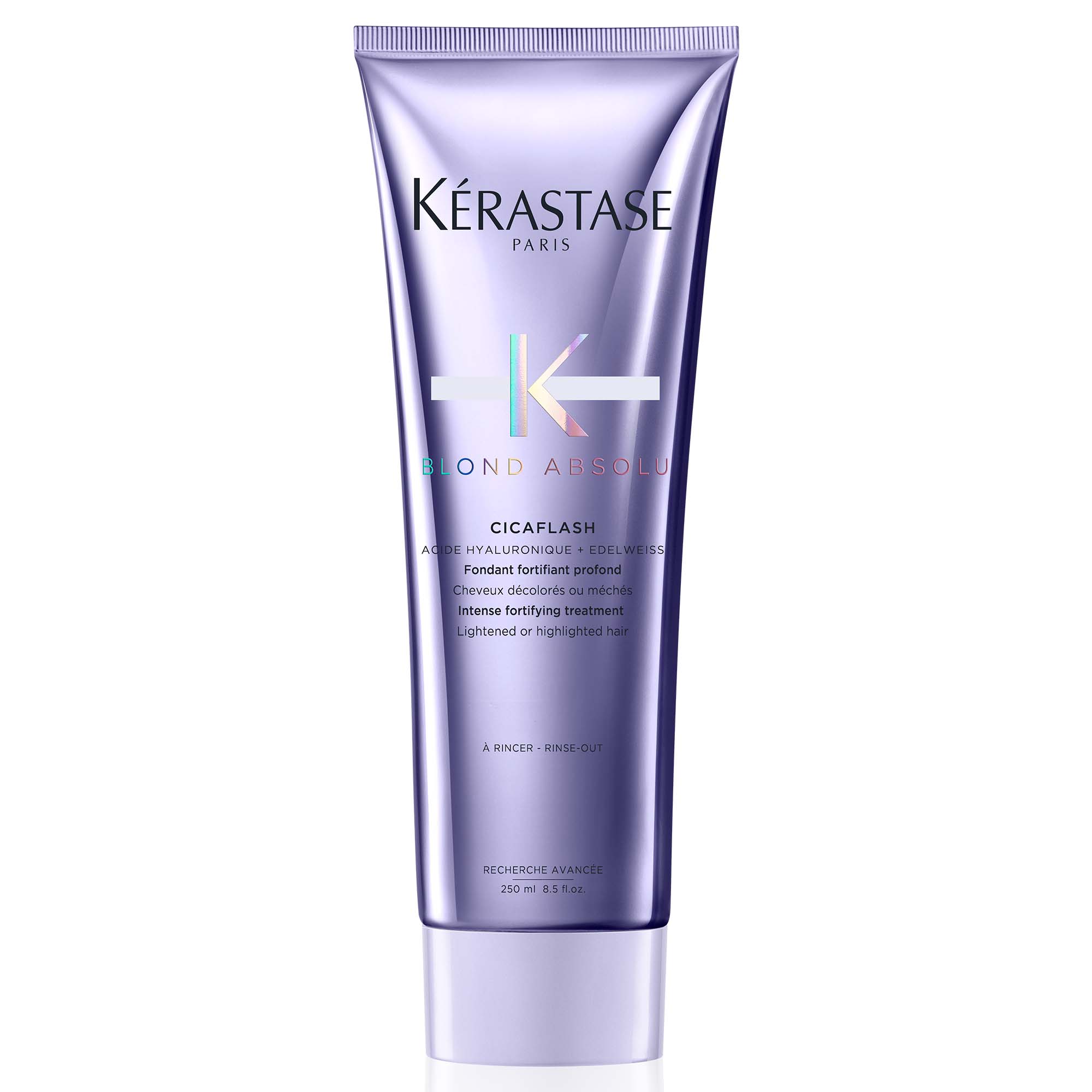Transparente, hellblaue Tube mit silberfarbenem Verschluss, Produktname „Kérastase Blond Absolu Fondant CICAFLASH