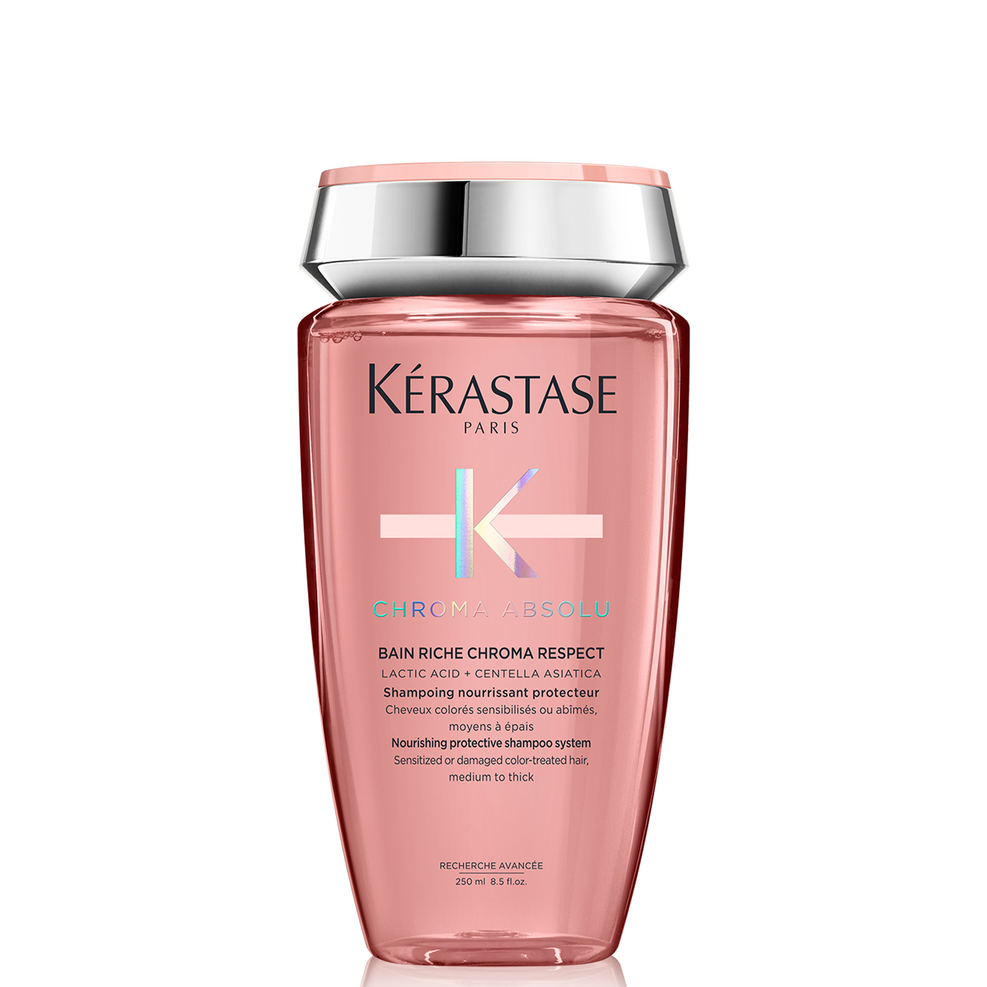 Roséfarbene Flasche mit reichhaltigem Farbpflege-Shampoo der Marke Kérastase, Produktname „Chroma Absolu Bain Riche Chroma Respect