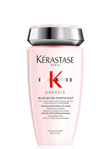 Roséfarbene Flasche mit silberfarbenem Deckel, Produktname „Kérastase Genesis Bain Nutri-Fortifiant