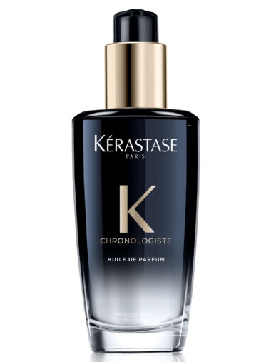 Schwarze Glasflasche mit goldfarbenem Pumpspender, Produktname „Kérastase Chronologiste Huile de Parfum